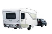 Next 380 caravan achter de auto